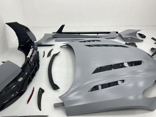 Aston Martin DB11 Carbon Fiber Body Kit DB11 Mansory-Stil Vorder- und Hinterstoß-Sparruff-Seitenrock-Schutzflügel-Hauben-Spoiler