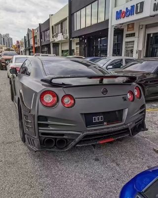 Für Nissan GTR R35 Kohlenstofffaserkörper-Kit GTR Upgraded Top Style Kohlenstofffaser Front und Heck Stoßfänger Seitenrock Spoiler